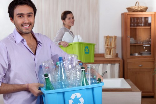 Clearance team transporting items for recycling and donation